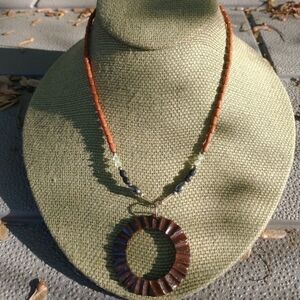 Women's brown wood bead necklace.